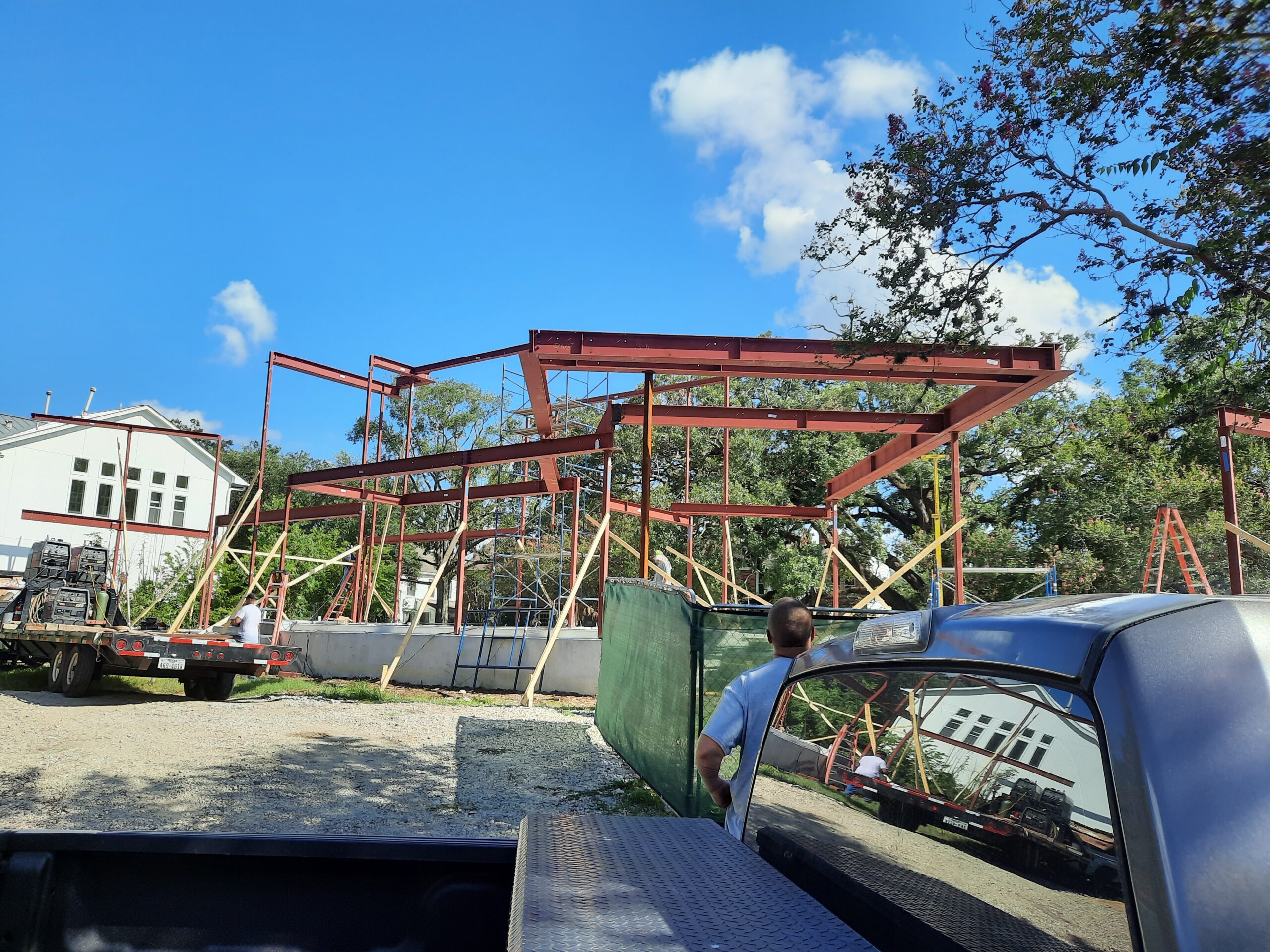 Residential structural steel beam installation in Houston home remodel
