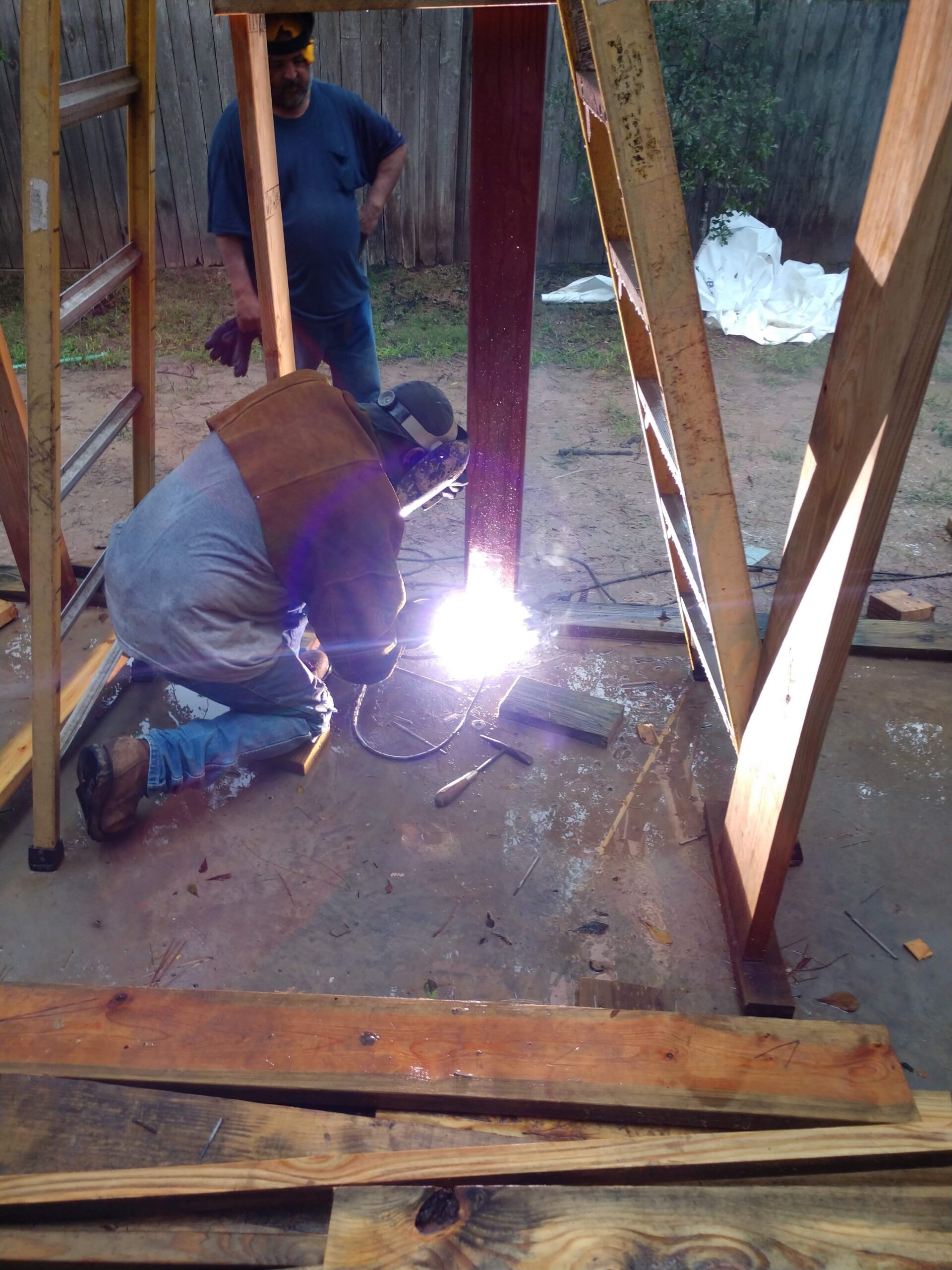 Structural steel delivery and field installation crew on Houston job site