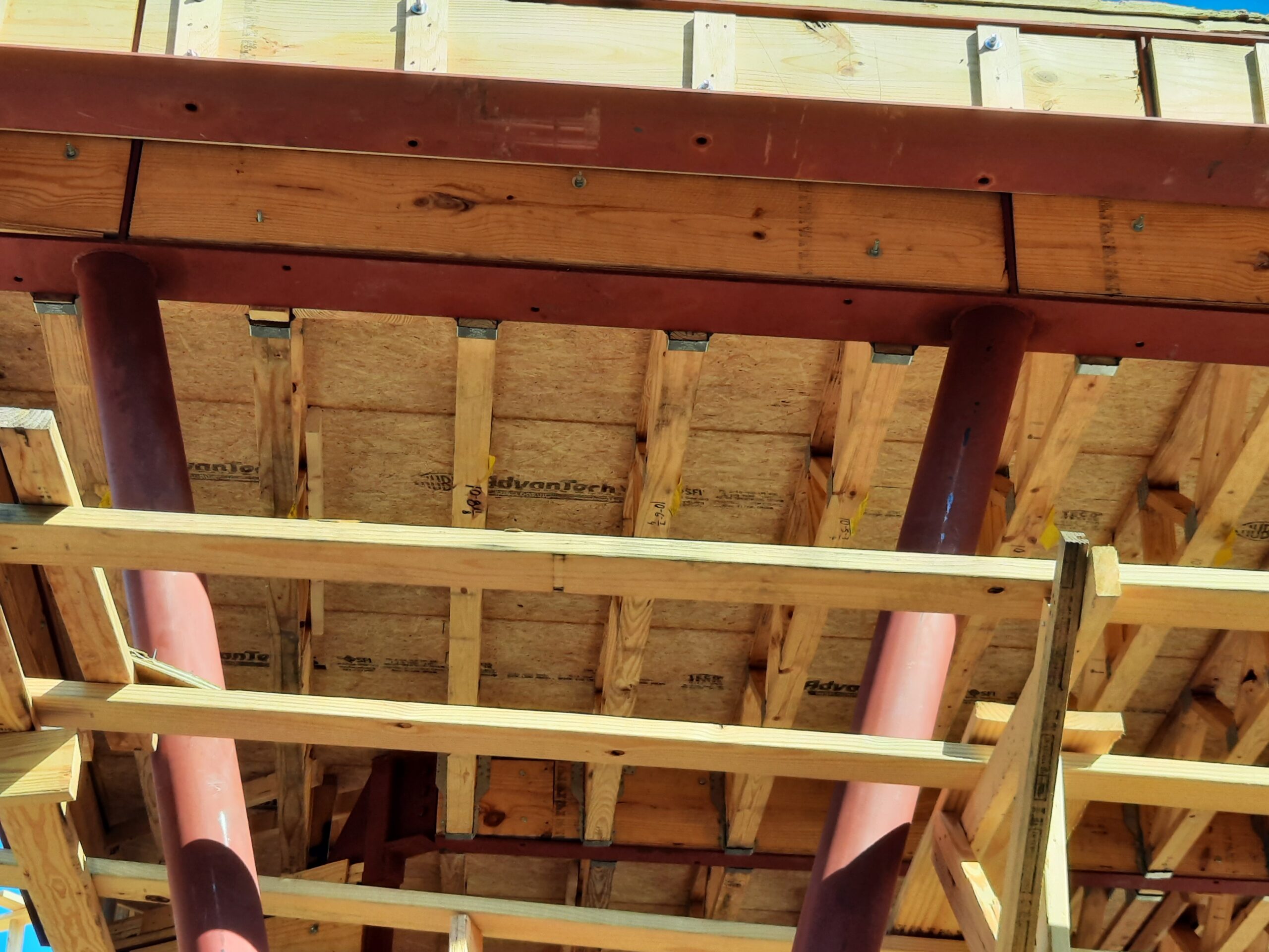 Structural steel columns headers and connection plates for second story addition in Katy Texas